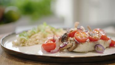 Schelvishaasje uit de oven met shiitake en trostomaatjes