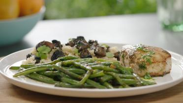 Varkensmignonette met quinoa, portobello en sinaasappeldressing 