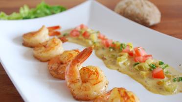 Scampi's met curry, appel en selder