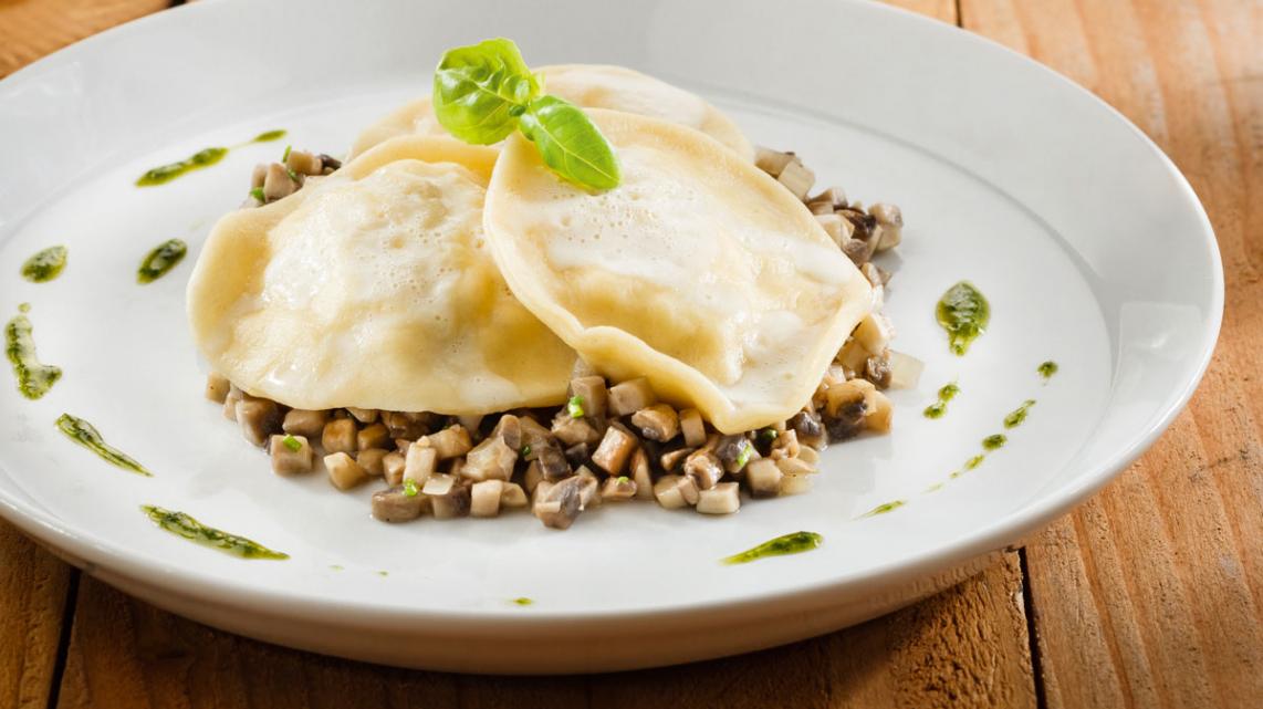 Ravioli van kabeljauw met champignons